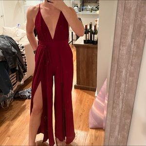 Red jumpsuit with an open back & 2 slits in legs